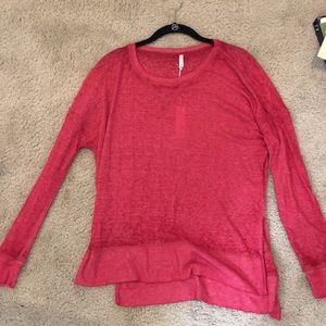 Red long sleeved top